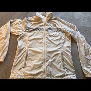 White with grey stripe Northface windbreaker